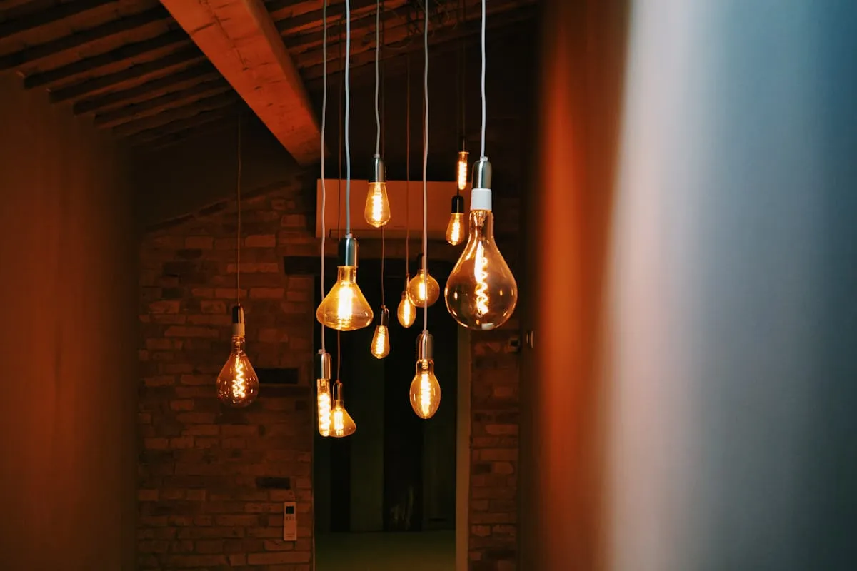 Modern room featuring a sculptural pendant fixture
