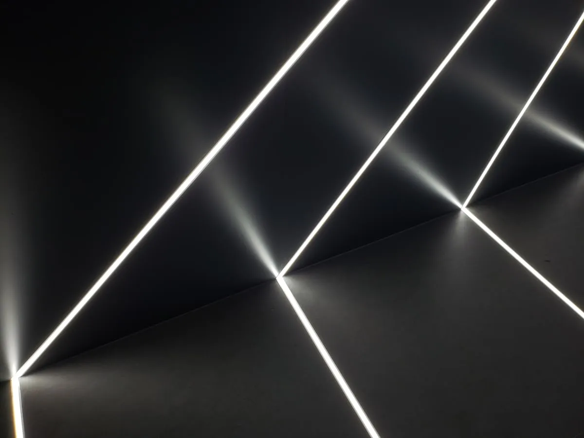 Warm modern interior with custom light placement