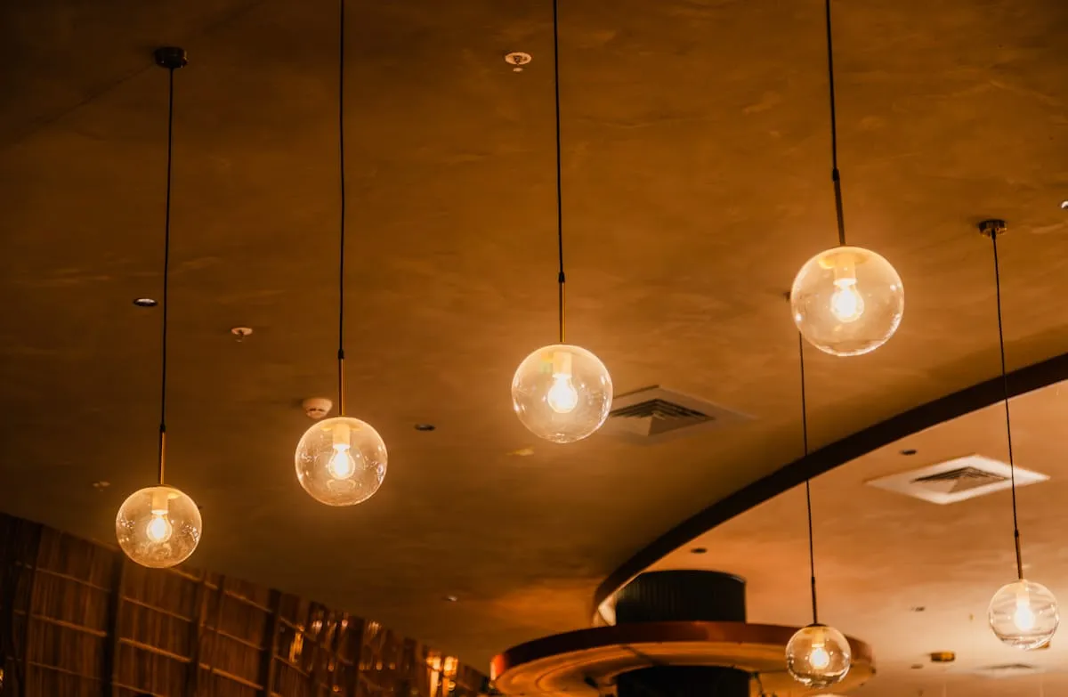 Layered room illumination with a warm finish